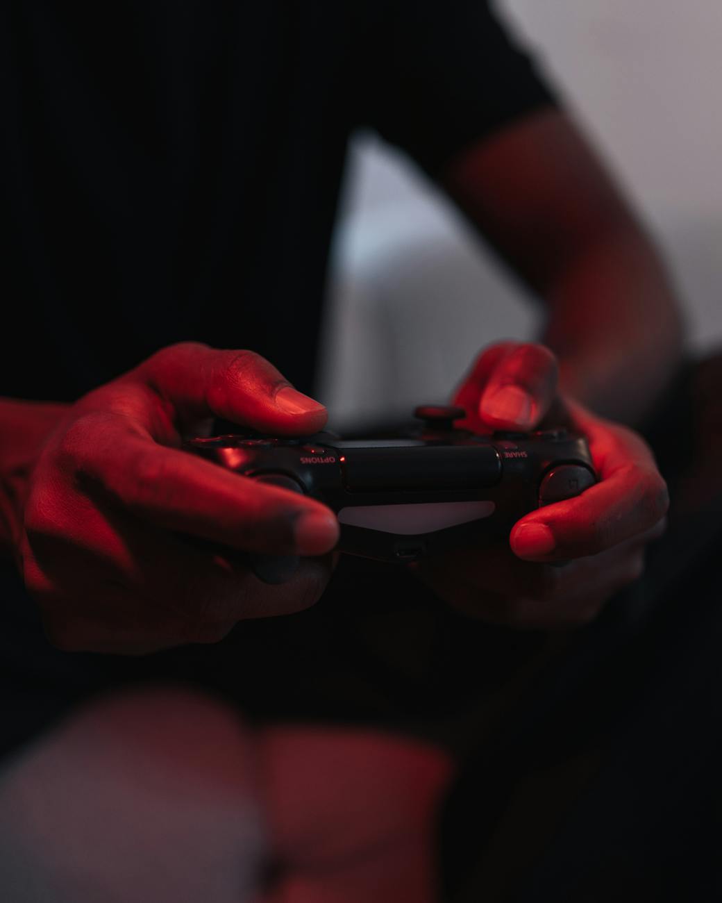 hands holding controller